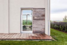 02 The house is surrounded by cultivated fields and abandoned farms