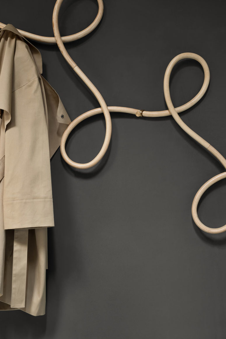 The loops are created by steaming and bending rounded lengths of wood