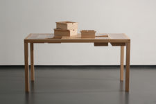 02 The pice is made of oak, there’s a raster where boxes can be inserted