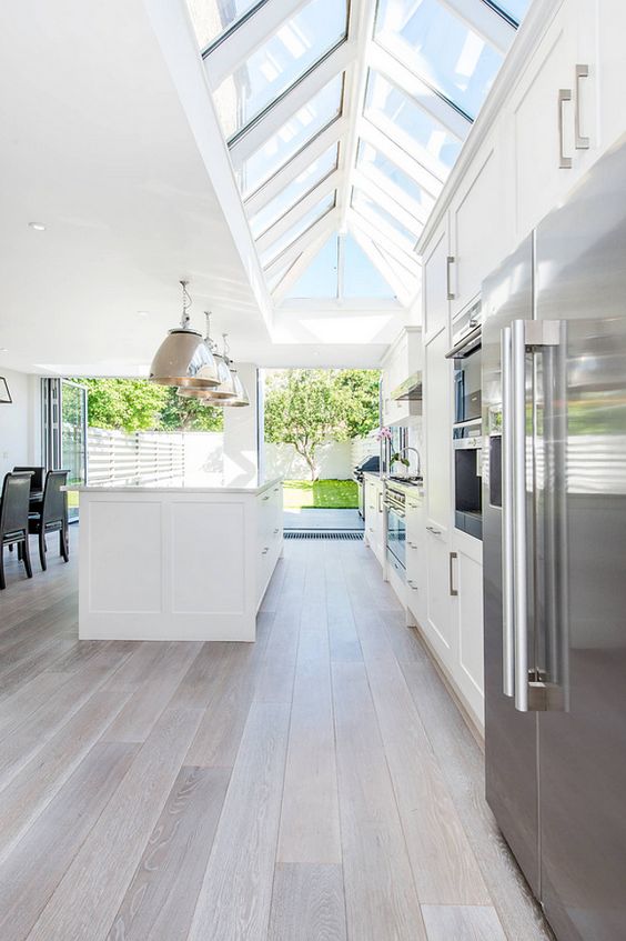 brushed oak floors create an airy feeling in the space