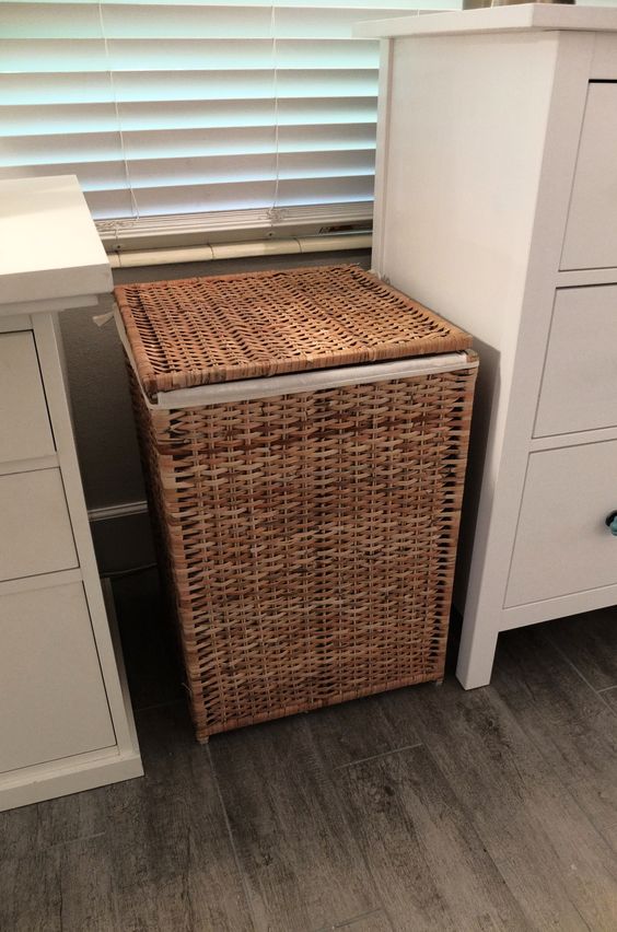 IKEA Branas is hand-woven rattan piece, which can hide your laundry hampers