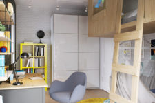 05 A white lacquer drawer unit and a bold yellow bookshelf were chosen for storage