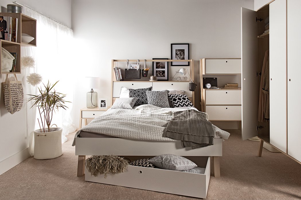 The lofted bed comes with integrated drawers and wardrobes that tuck neatly away