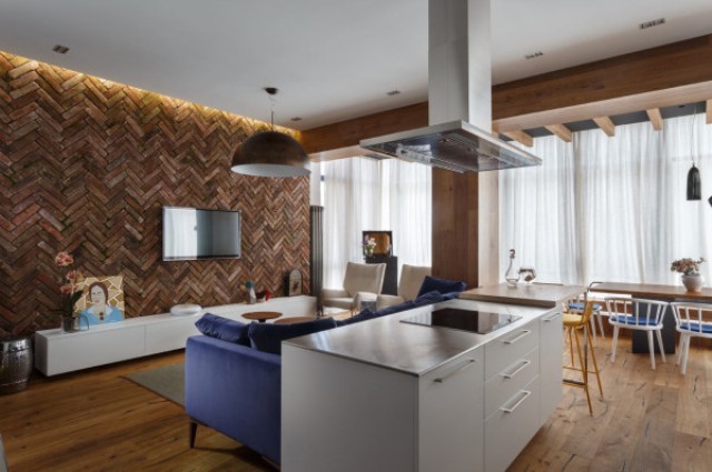 In the living room you can see a real brick wall made from reclaimed bricks