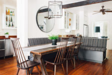06 The breakfast nook is decorated dark, rustic and vintage