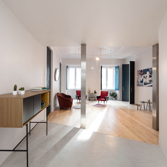 The living area is a limbo composed of three clearly defined moments while being just one space