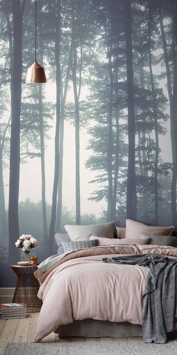 mysterious forest wallpaper adds a relaxing touch to the bedroom decor