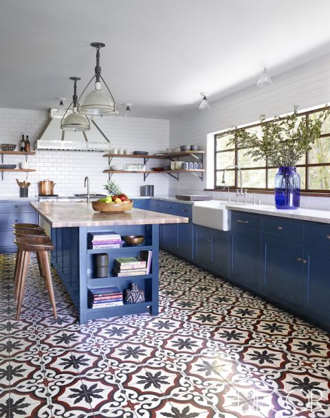 bold mosaic floor is strike and water resistant, ideal for a kitchen