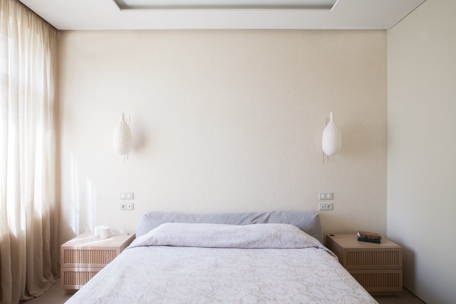 The master bedroom is airy and serene, the decor is simple and really reminds of Japan