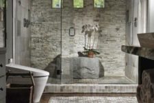 11 faux stone in the shower as it’s durable and looks cool and wild