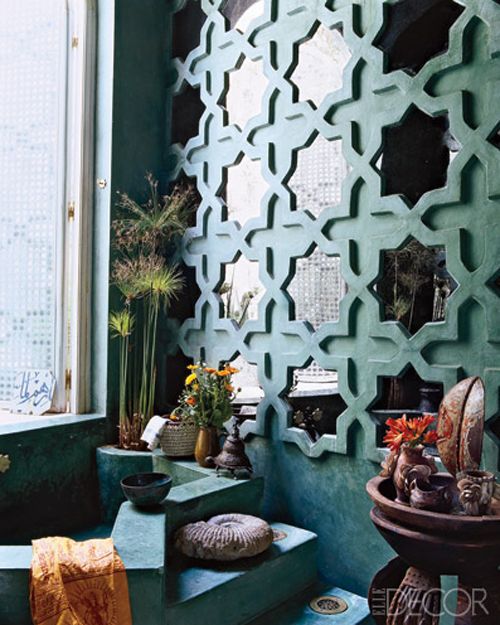 bold green bathroom with mirror tiles