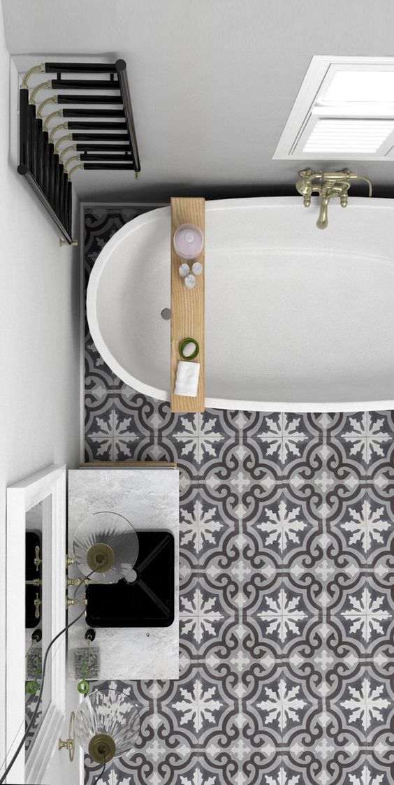grey and white porcelain tiles create an eye-catchy touch in this bathroom