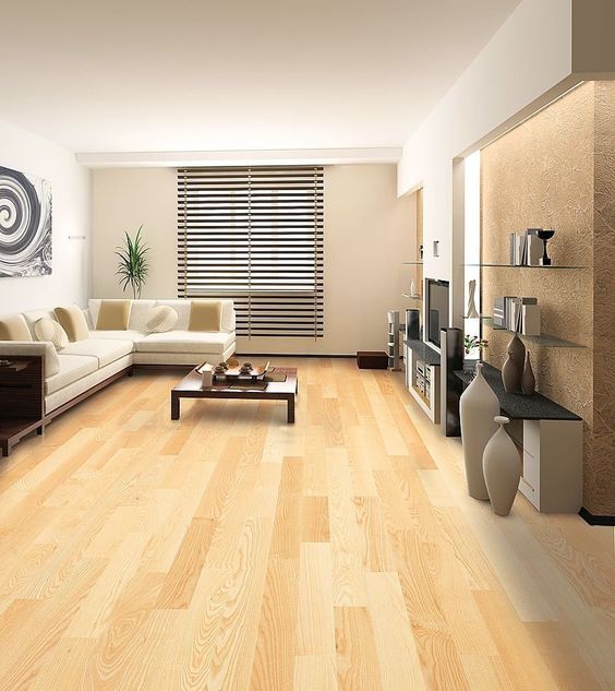 modern liivng eoom in light shades is highlighted with light bamboo floors