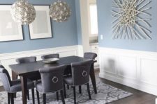 17 modern coastal dining area with wainscoting walls that highlight the blue color