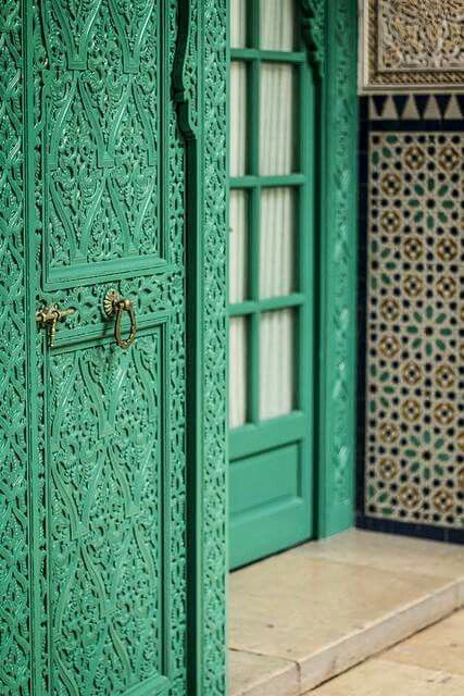 bold carved doors add an exotic feel
