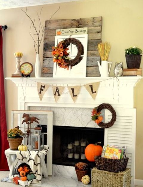 burlap bunting, wheat, fall wreath and a small pumpkin on a stand burlap bunting, wheat, fall wreath and a small pumpkin on a stand