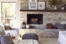 24 faux stone fireplace wall becomes a focal point in this cozy living room