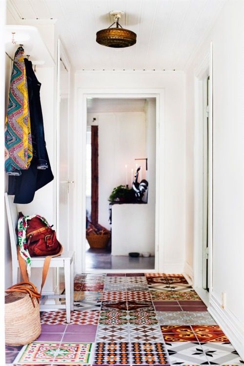 patchwork tile floor for an entryway to set a mood