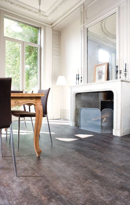 dark grey cork floors give a refined look to this white space