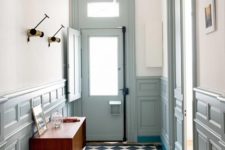 35 pale serenity wainscoting and frames all around the hallway