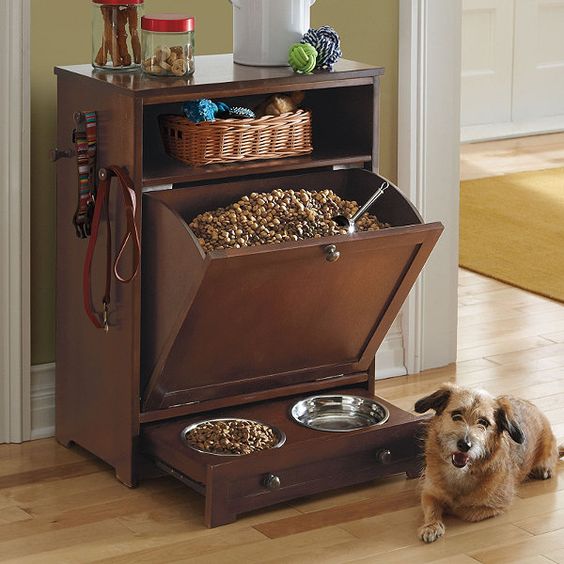 dog feeding station with a tilt-out drawer for food and bowls
