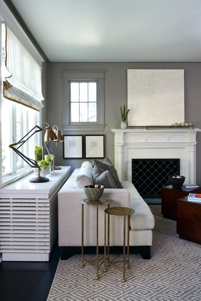 a cover that acts as a console table to display some decor and table lights (Sightline Art Consulting)