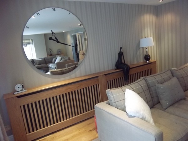 add some warmness to your interior with a wooden radiator cover (Spaceworks Bespoke Joinery Ltd)
