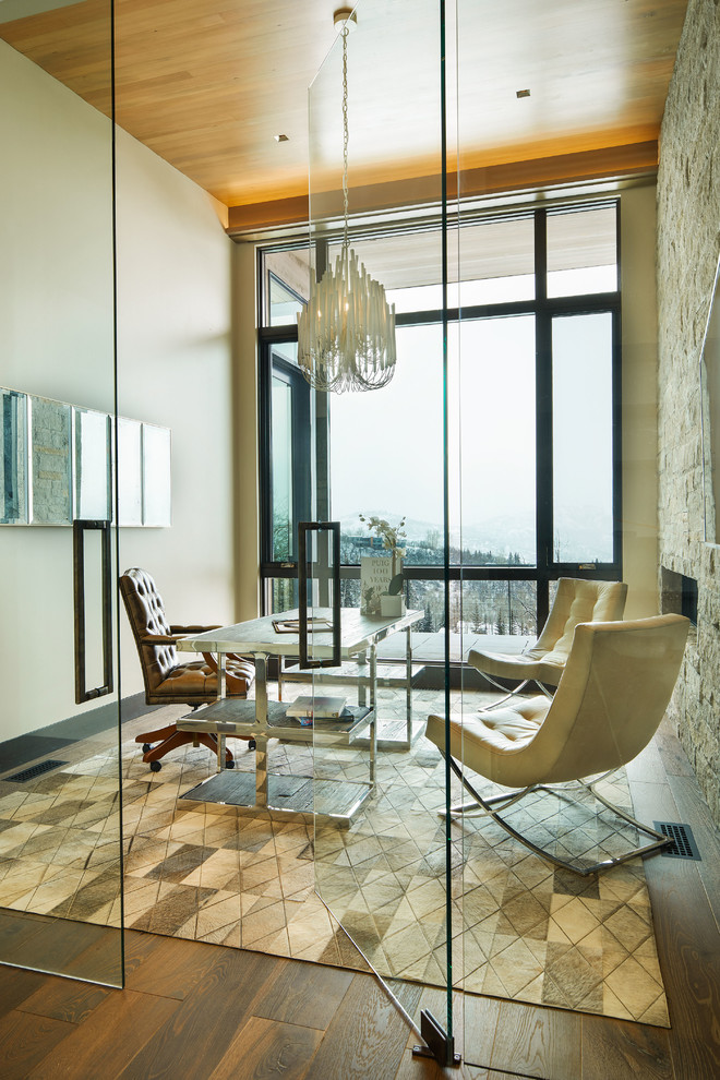 For a modern office space a stone wall acts as a touch of nature and a way to bring some of that outdoor vibe inside. (KA DesignWorks, Inc.)