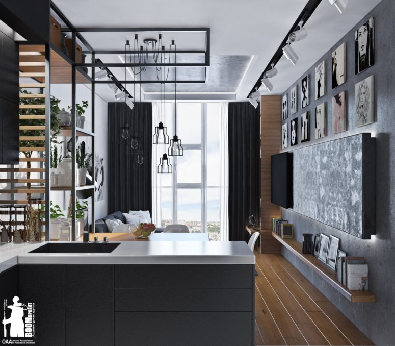 A loft kitchen united with a dining space and a living room