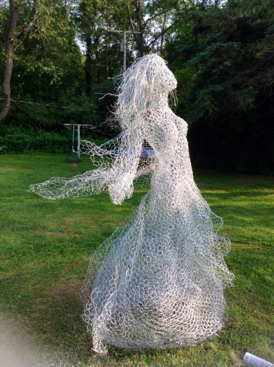 beautiful chicken wire ghost may be spray painted to glow in the dark
