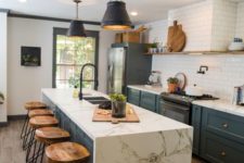 03 a marble counter gives this traditional kitchen a modern look