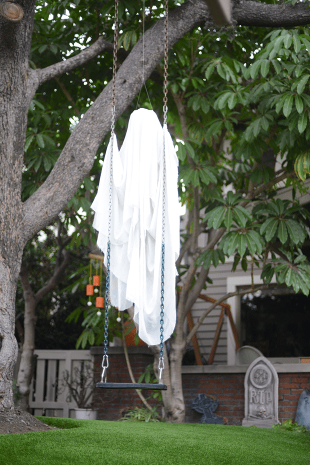place a sheet ghost on a swing in your backyard to get a cool effect