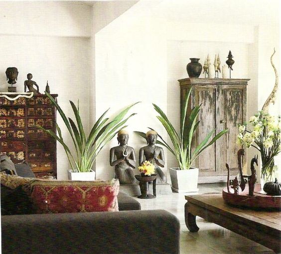 white walls in this oriental living room make a perfect backdrop and fill the room with light