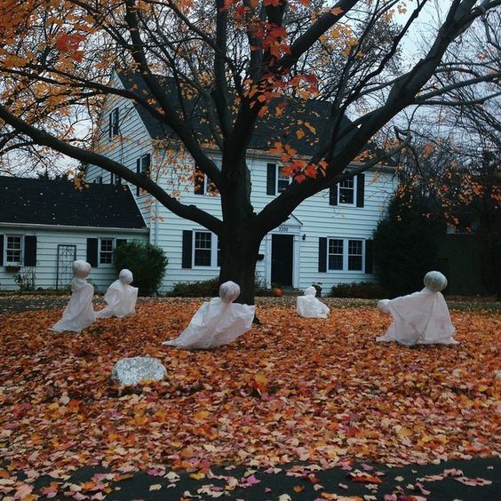 fabric and foam ghosts in the front yard