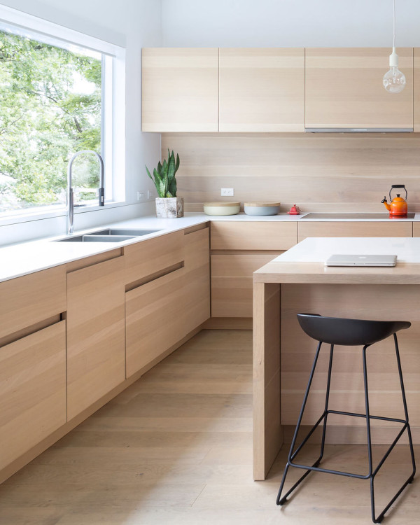 minimalist kitchen design The kitchen is minimalist and is clad with white oak as the floors in the house