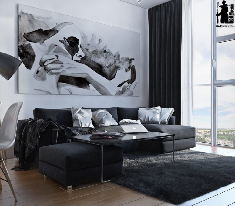The living space has a large sectional sofa, an oversized artwork and floor to ceiling windows