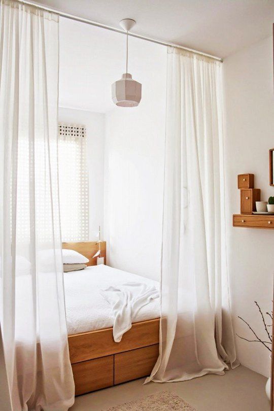 sheer off-white curtains will delicately divide the space
