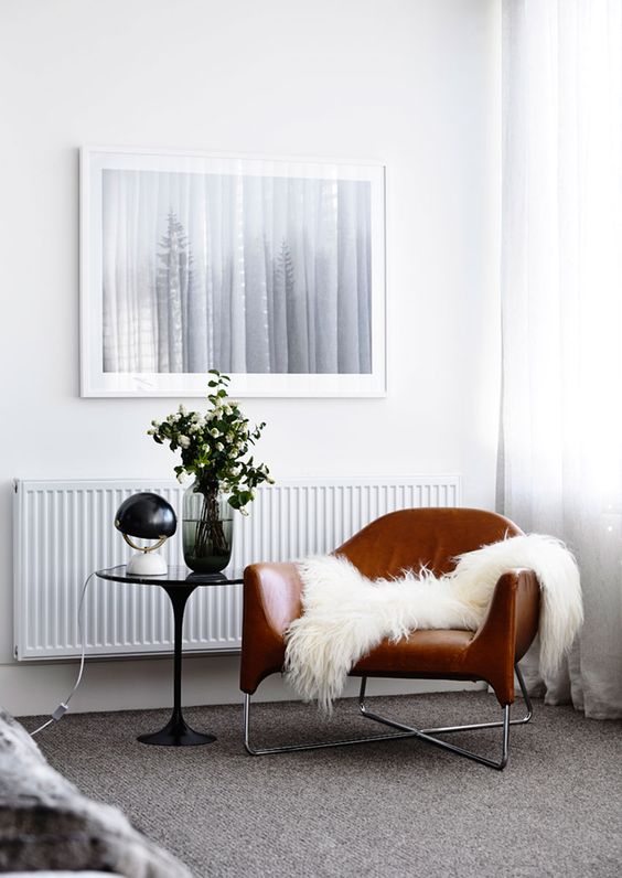Leather, fur and carpet floors give a textural look to the room