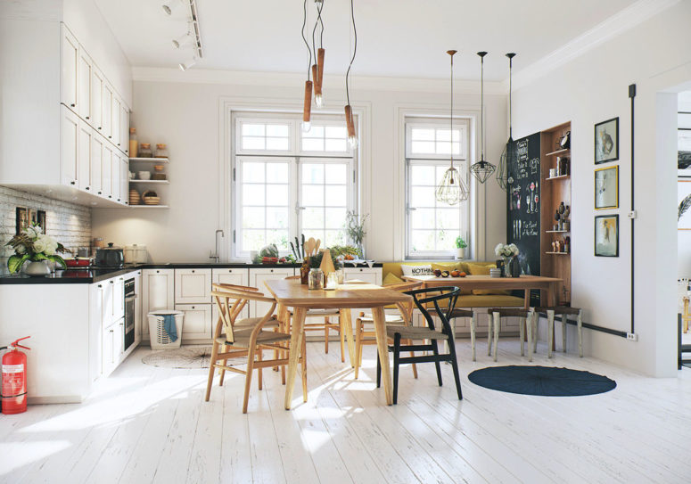 White cabinets with black counters create a bold contrast, and a dining zone in the center can be used for cooking