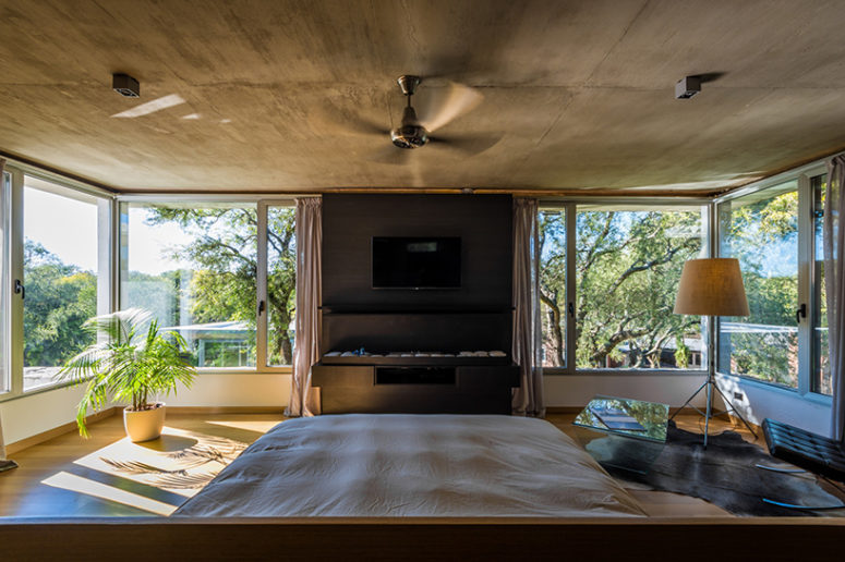 the large master bedroom at the home’s upper level