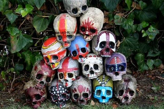 colorful tiki skulls for Halloween decor