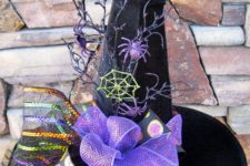 09 velvet witch’s hat with purple decor and spiders