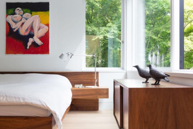 The bedroom boasts of cool views thanks to big windows; there's wall mounted furniture to save some space