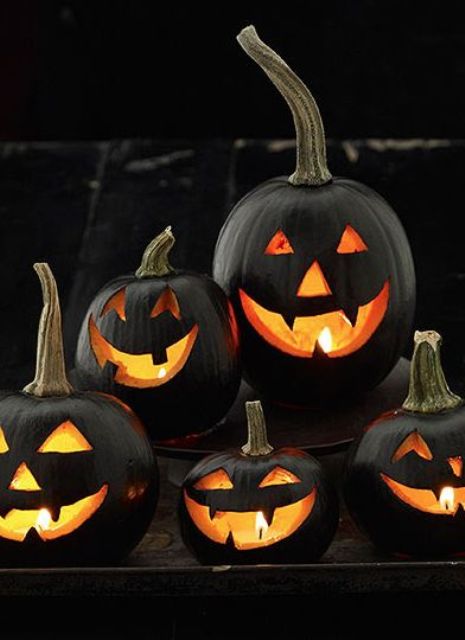 black jack-o-lanterns for decorating outdoors are a stylish ensemble