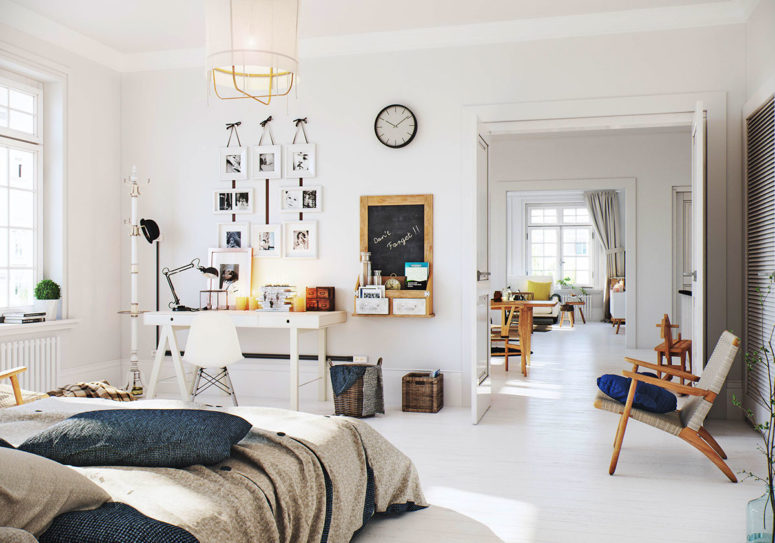 The home office nook is all-white with photos and a chalkboard with storage