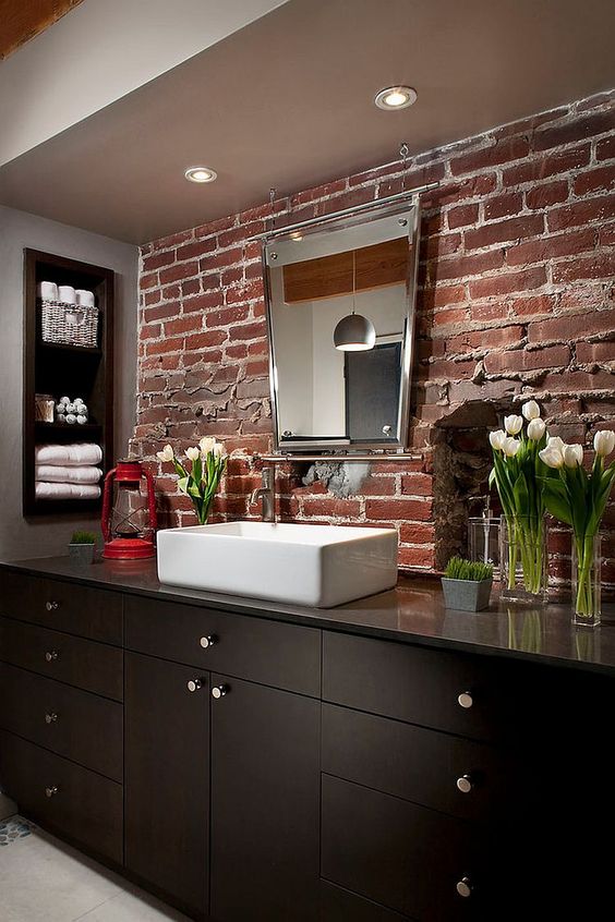 exposed brick backsplash for the modern industrial bathroom