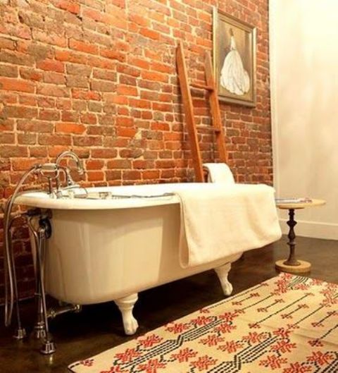 bring industrial chic to your bathroom with a brick clad