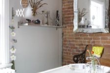 18 make your bathroom more homey with a rough brick wall