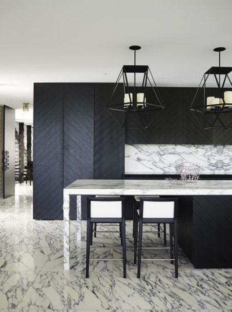 marble and chevron clad wood make this kitchen eye-catchy and interesting