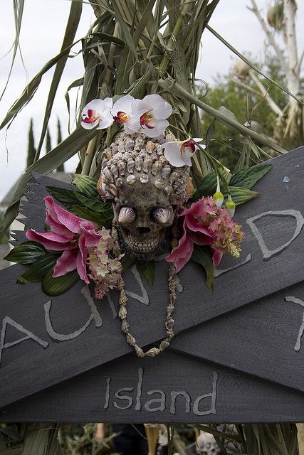 shell decorated skull with tropical flowers for outdoor and indoor decor